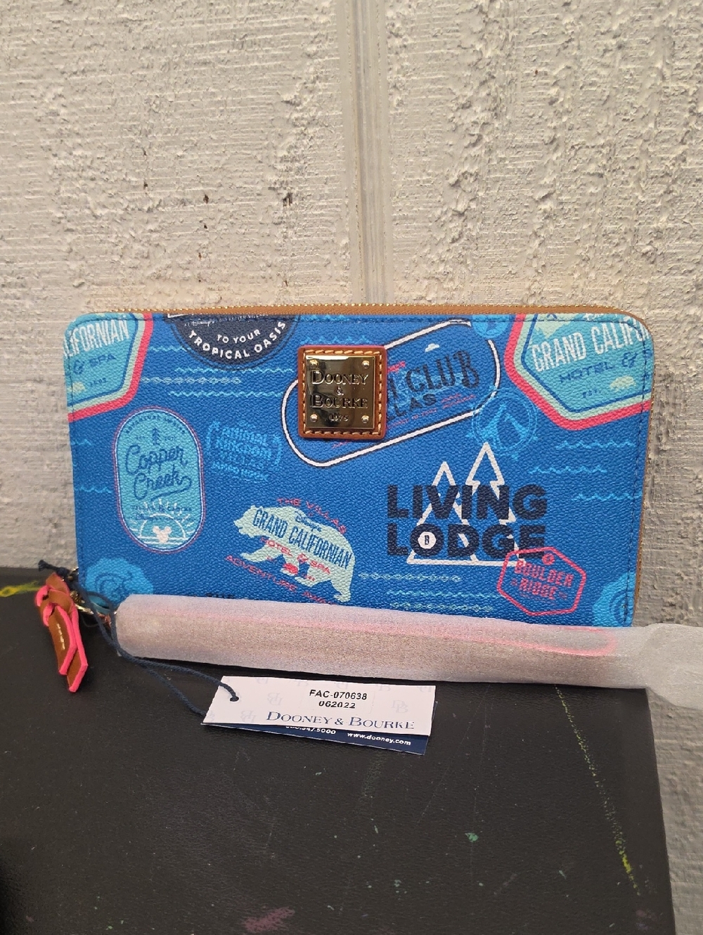 Dooney & Bourke Blue Travel Patch Zip Wallet